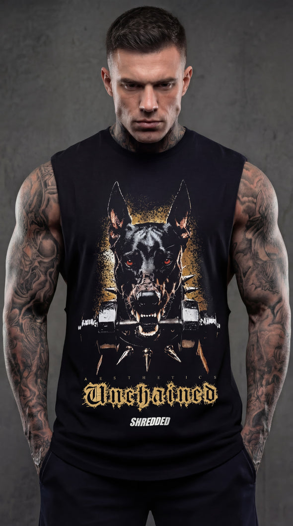 Man wearing a black sleeveless shirt with a graphic design of a dog and text on a dark background